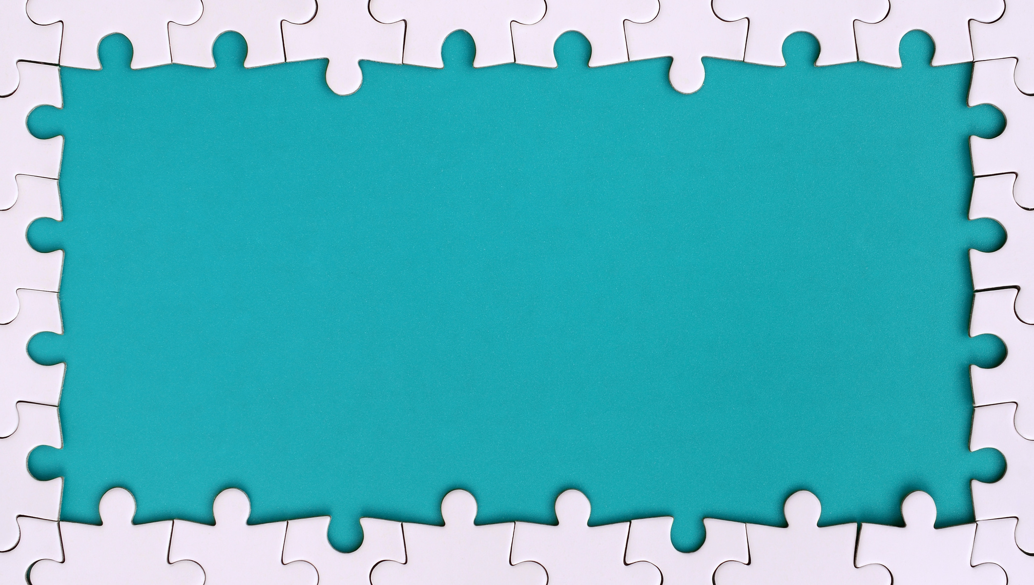 Framing in the Form of a Rectangle, Made of a White Jigsaw Puzzle around the Blue Space